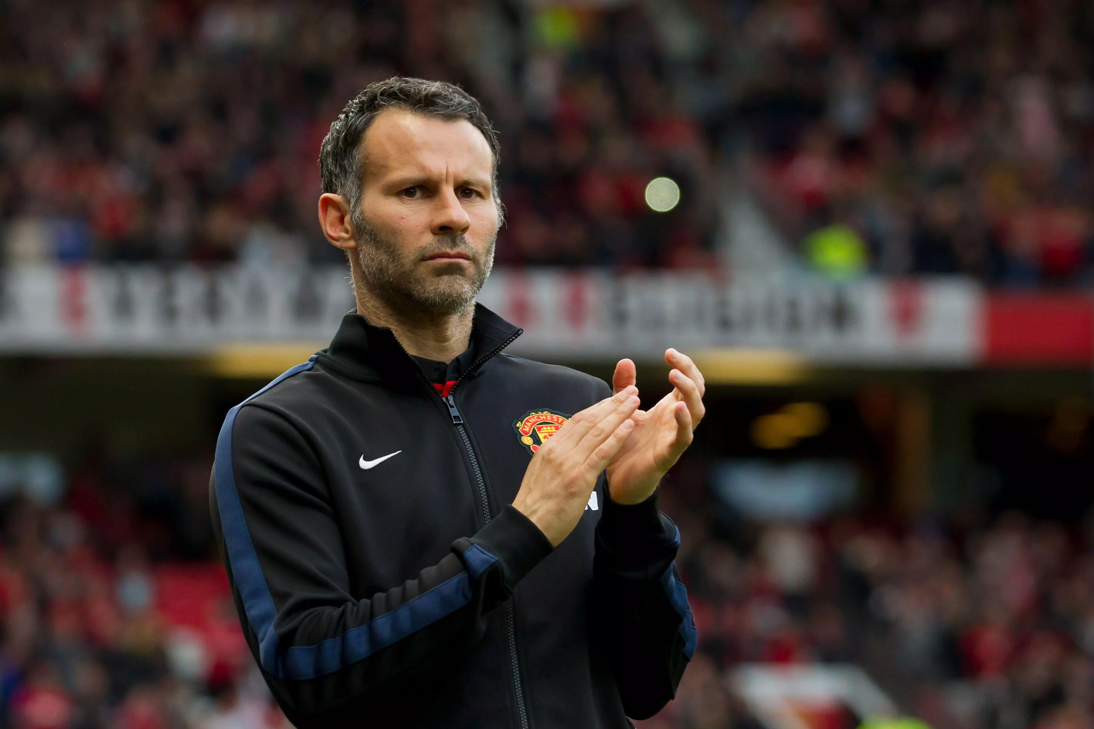 Ryan Giggs applauds the fans at Old Trafford during his time as interim player-manager of Manchester United