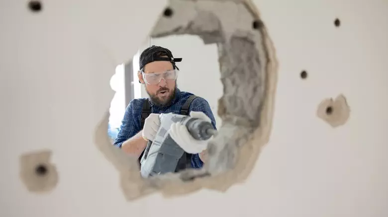 Rotary hammer on wall